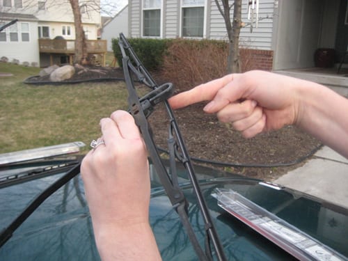 Push the hook through the center - replace wiper blades