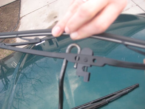 Line the clip up with the hook - replace wiper blades