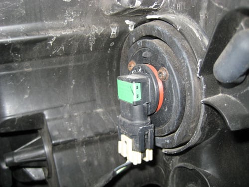 locate the light bulb and wiring - change a headlight