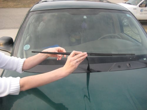 move the blade into a horizontal position - replace wiper blades