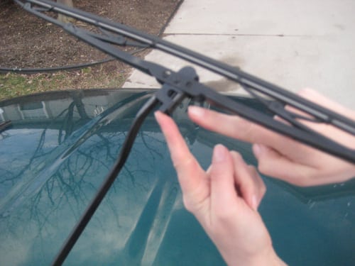 Slide the clip into the hook until you feel the clip lock into place - replace wiper blades