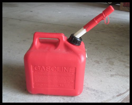 Here is an example of a gas can with a safety device on the nozzle.